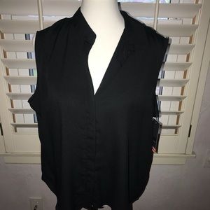 Sleeveless black NWT blouse.